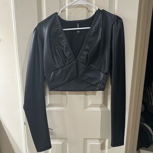 Black pleather long sleeve cropped top.